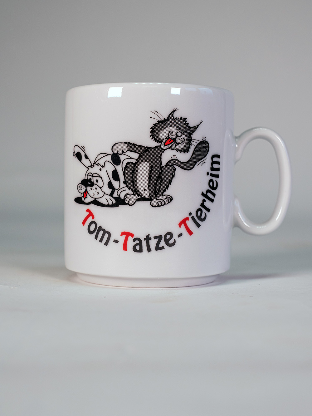 Tom-Tatze Tasse 1